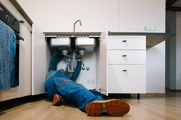 Professional Emergency Plumber technician working in Trion, GA